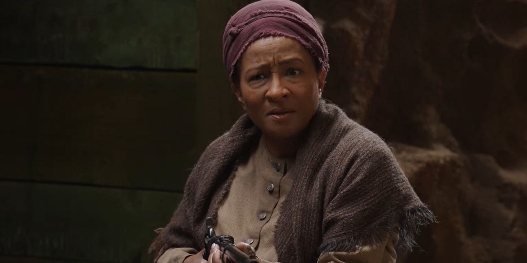 World History Part II Harriet Tubman, played by Wanda Sykes, with a gun