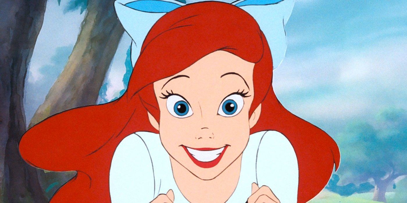 Ariel laughs happily in The Little Mermaid
