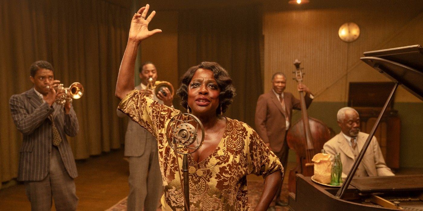 Viola Davis holds up her microphone as the band performs at Ma Rainey's Black Bottom Netflix