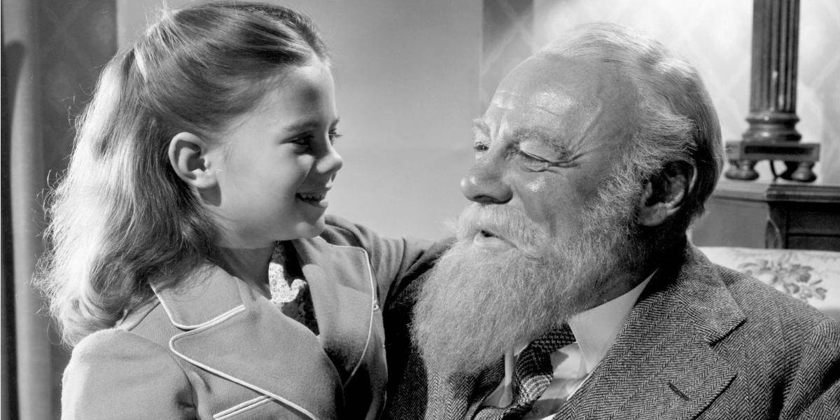 Kris Kringle and Susan smile at Miracle on 34th Street