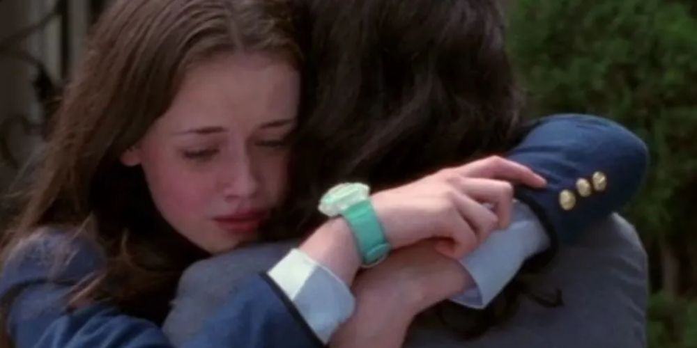 Rory and Lorelai hug outside Chilton after Rory's first day at Gilmore Girls