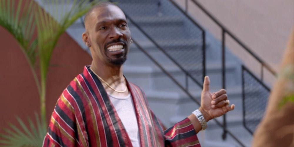 Charlie Murphy standing outside in the black mantle of Jesus