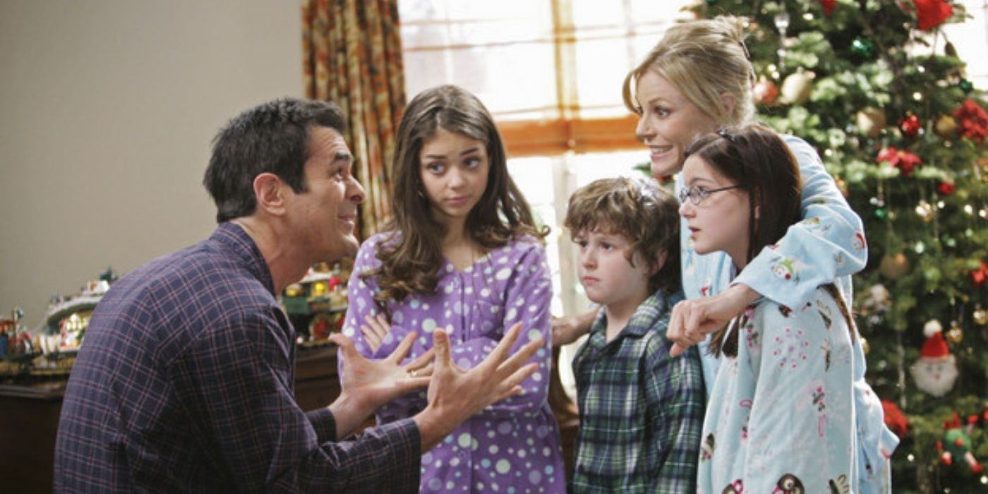 Dunphys stand together at Modern Family's Christmas