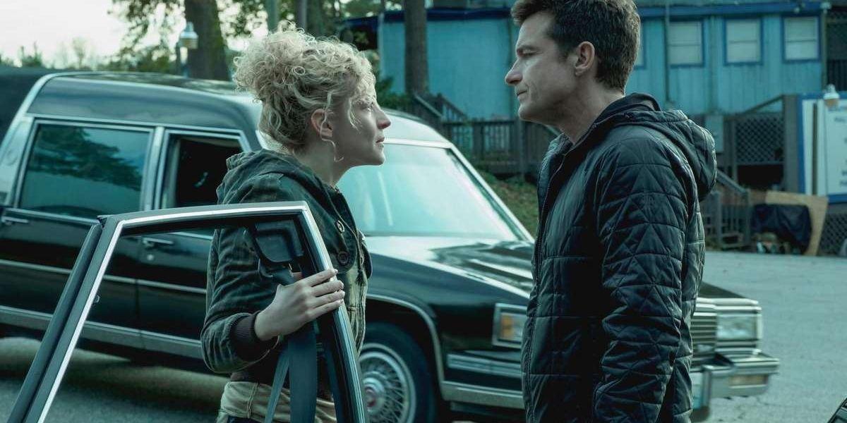 Ruth and Marty next to her car in Ozark.