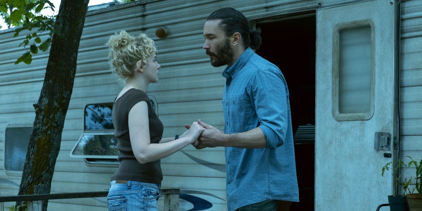 Ruth and Ben holding hands outside of Ruths house in Ozark.