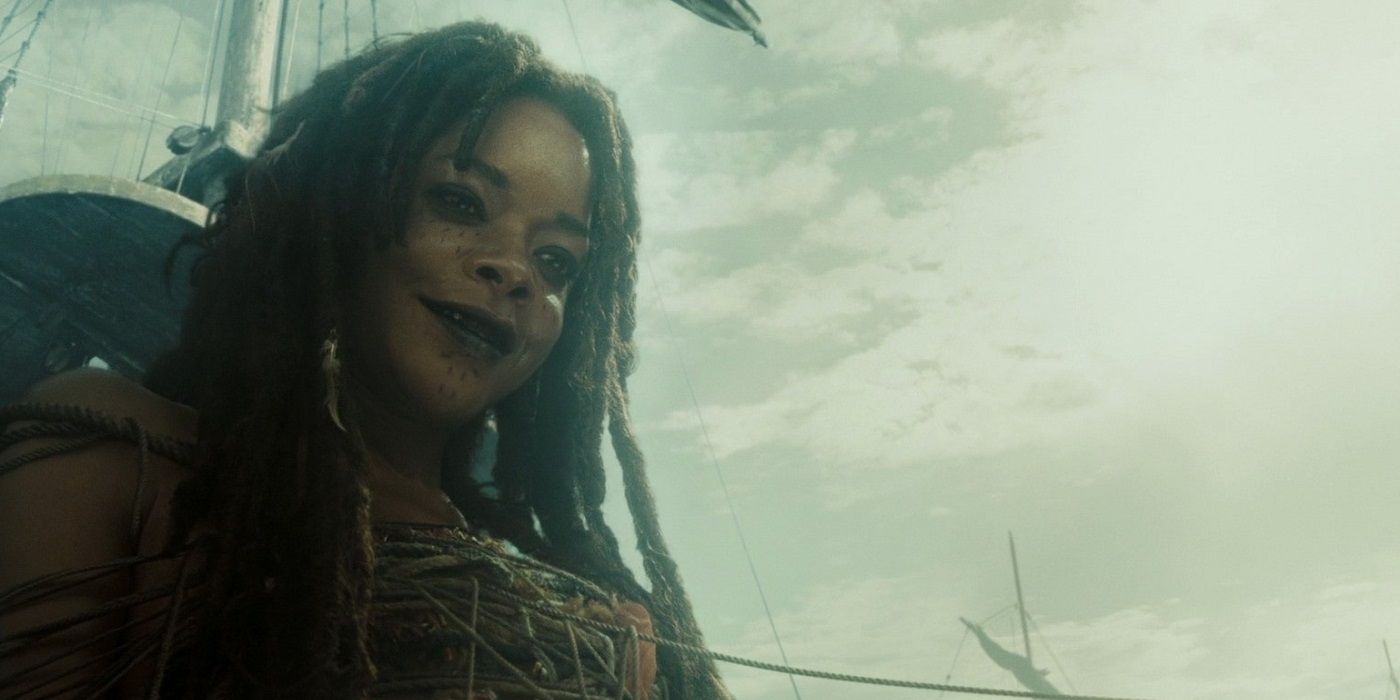 Calypso smiles at the bow of the ship in Pirates of the Caribbean