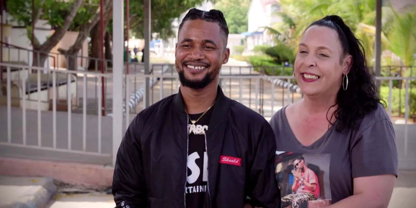 Usman Sojaboy Umar and Kim Menzies smile at their 90-day fiance