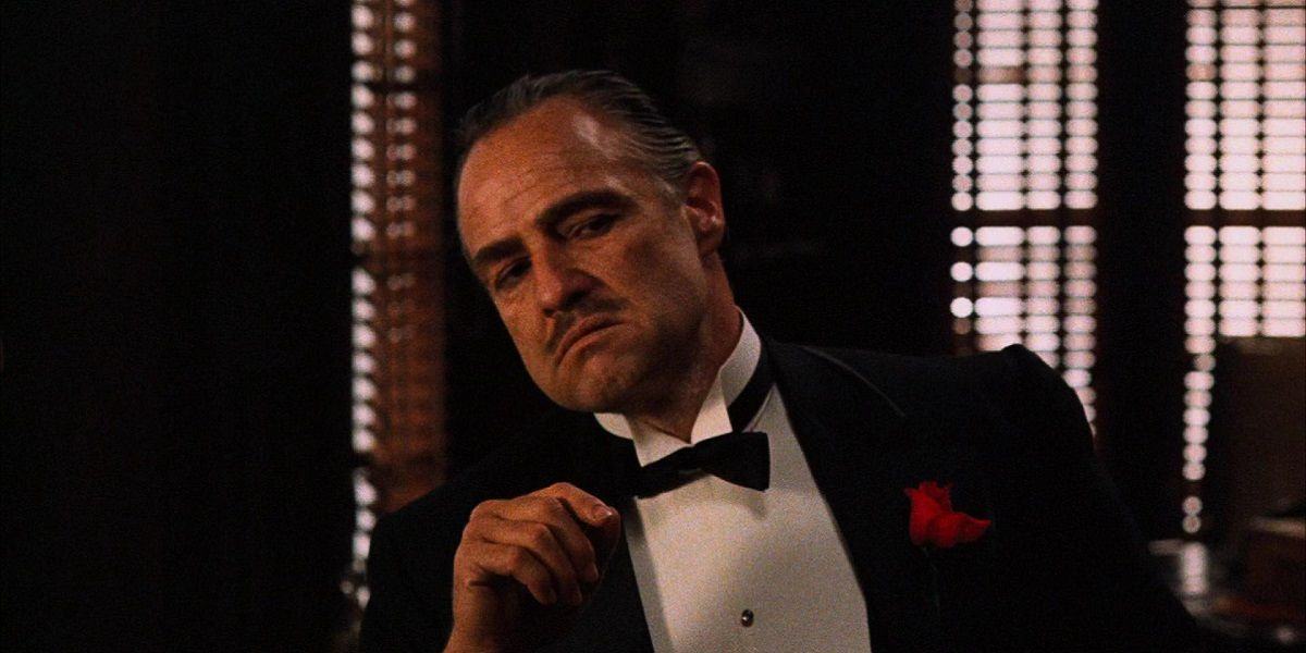 Don Corleone sits in The Godfather in a suit.