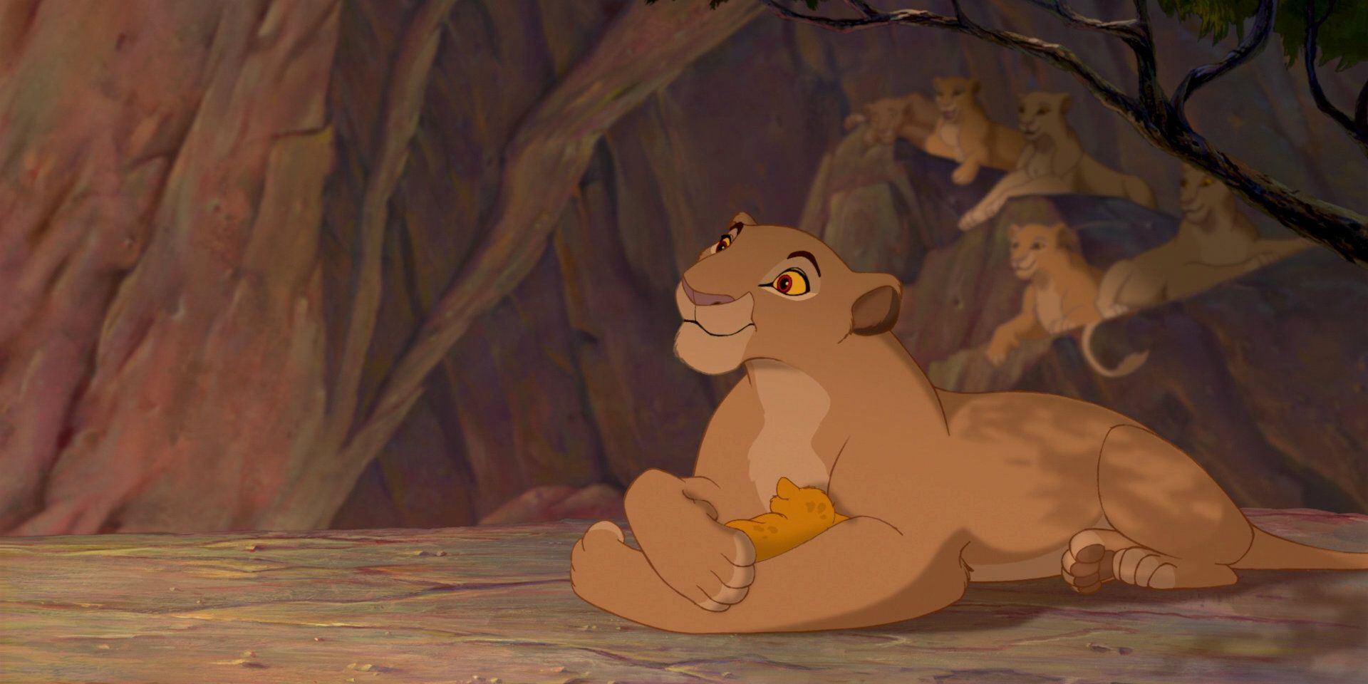 Sarabi holds baby Simba in The Lion King