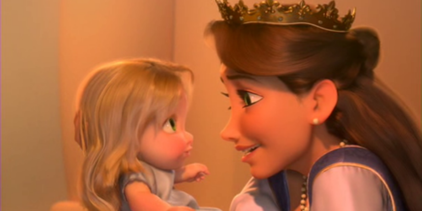 Queen Arianna holds a young Rapunzel in her arms