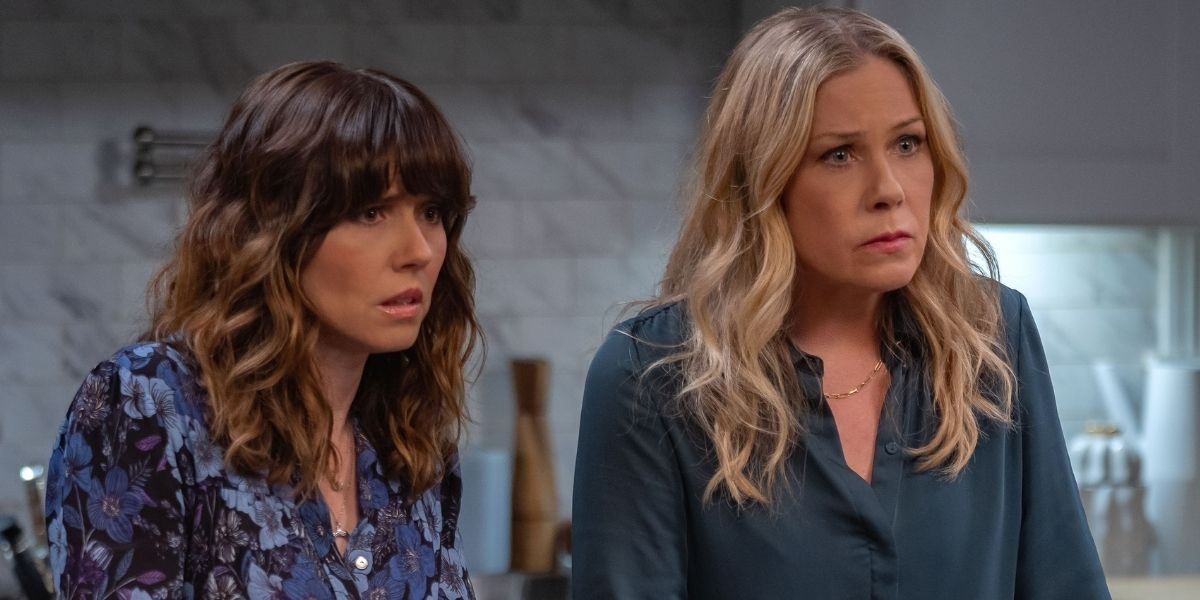 Judy and Jen looking confused in the kitchen in Dead To Me