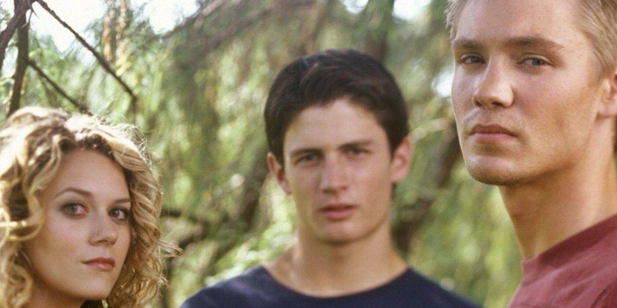 Peyton, Nathan, and Lucas posing for camera in the woods in One Tree Hill