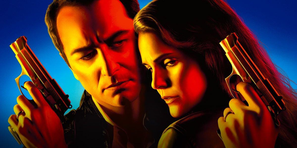 Philip and Elizabeth holding guns in promotional photo for The Americans