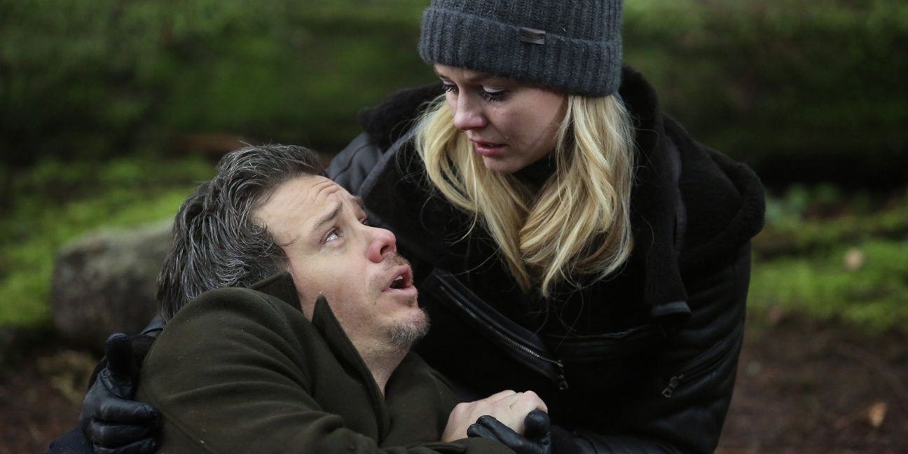 Neal spends his last moments in Emma's arms before dying in Once Upon a Time