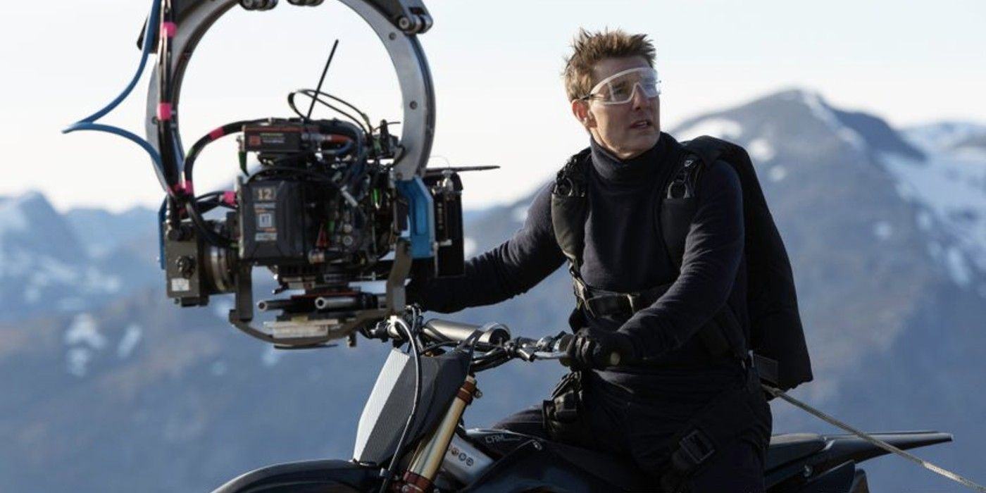 Tom Cruise rides on a motorcycle in Mission: Impossible 7