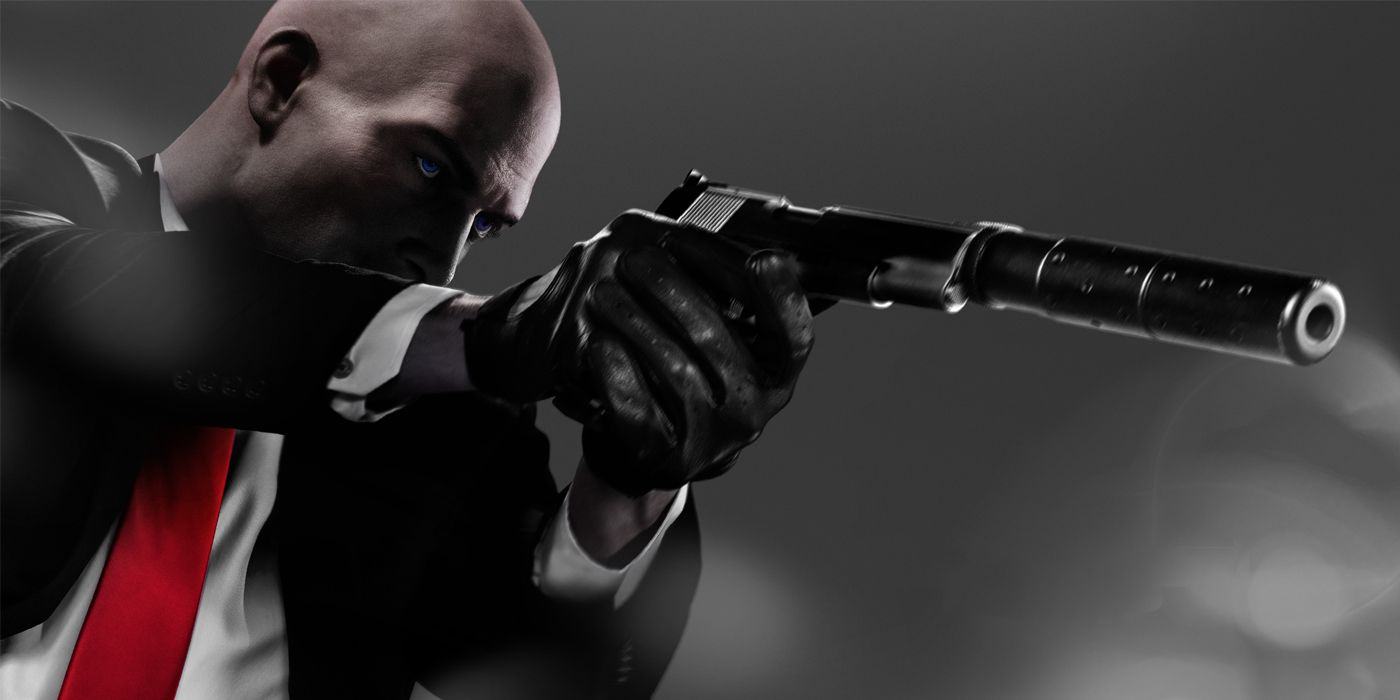 Agent 47 aims his suppressed silver pistol in Hitman 2 Gold Edition promo art