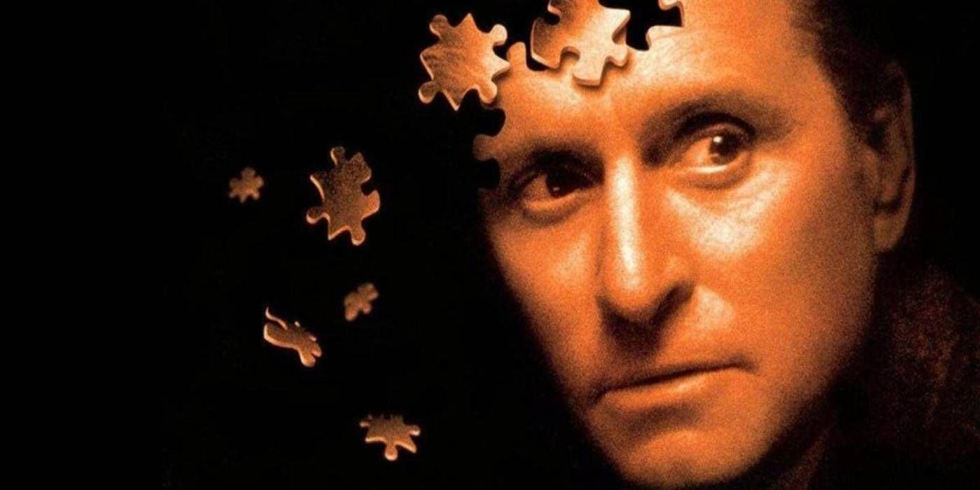 Crop of the game poster with Michael Douglas' face falling into a jigsaw puzzle