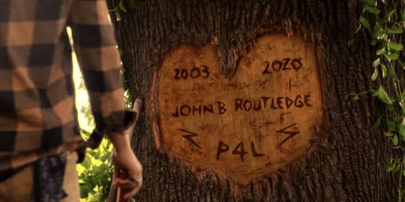 Pogues carves a tree on the OBX in honor of John B