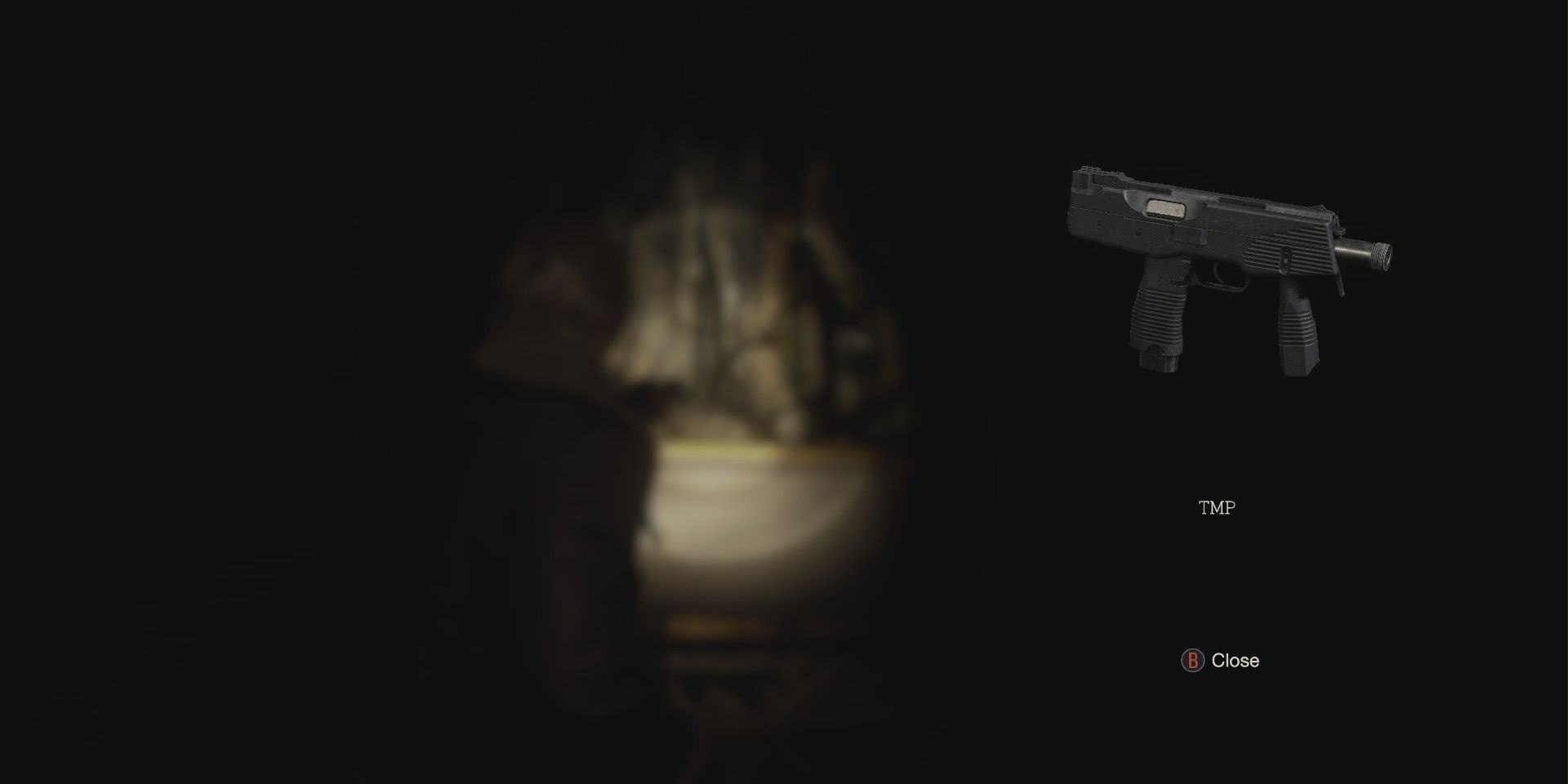 Get TMP notifications in Resident Evil 4 Chainsaw Demo.  Leon's face in front of the open box became dark and blurred.