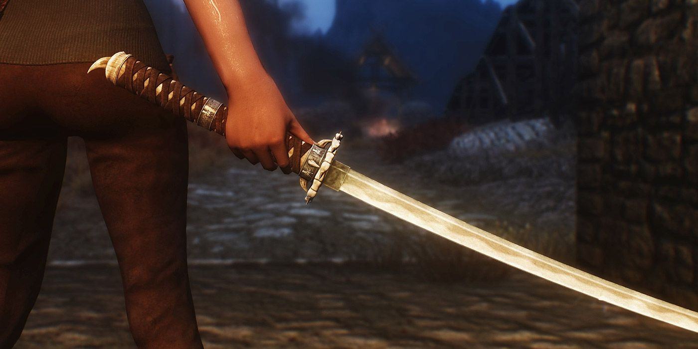 A player holding the Dragonbane sword in Skyrim