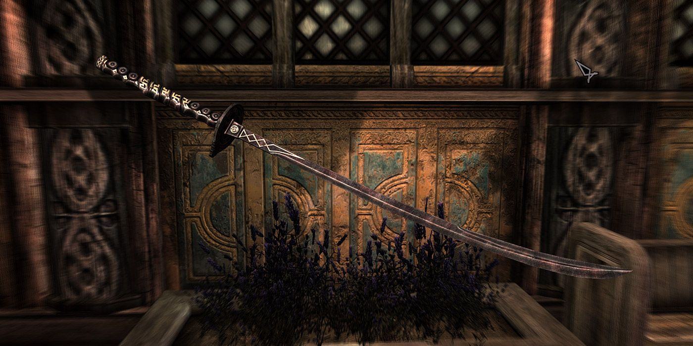 A shot of the Ebony Blade in Skyrim, an engraved katana made out of dark materials.