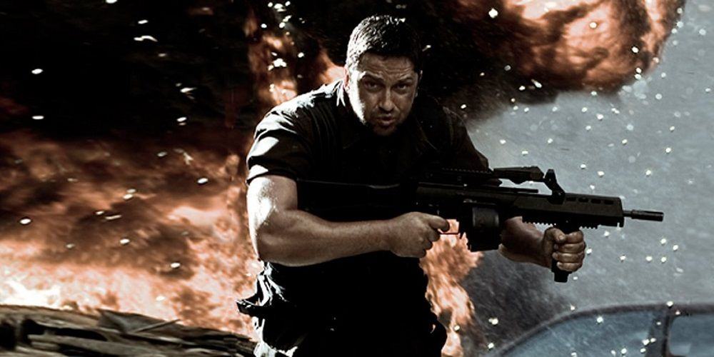 Gerard Butler as Kable in Gamer, running after the explosion with a gun