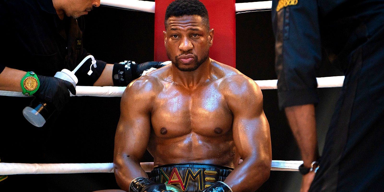 Jonathan Majors as Damian sitting in the corner of the ring in 'Creed 3'