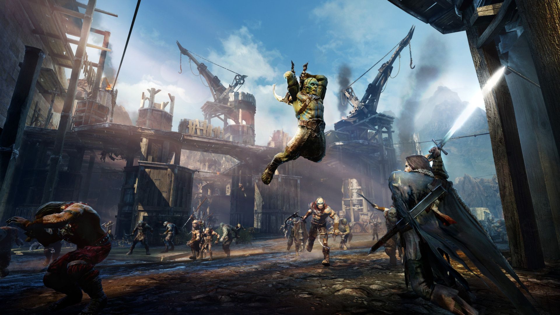 Shadow of Mordor screenshot showing Orcs attacking the player character in the wooden barracks