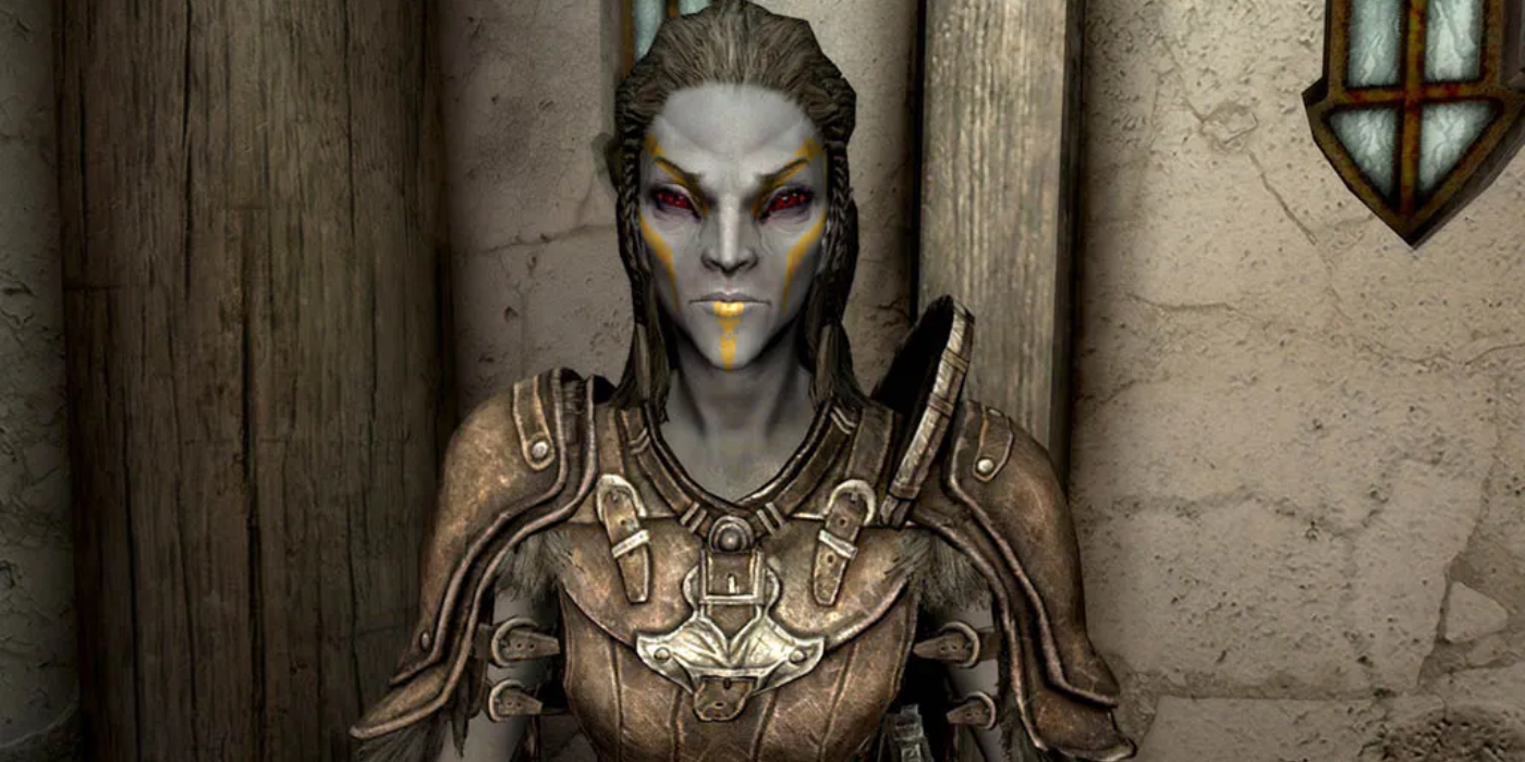 Close-up of Skyrim's Jenassa looks serious and professional with a yellow battle coat.