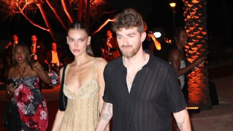 Drew Taggart of The Chainsmokers holds hands with model Marianne Fonseca during a date night in Miami!