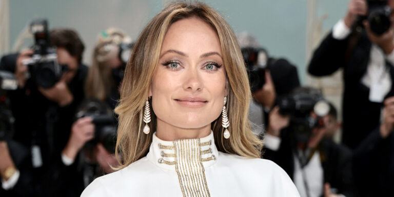 Olivia Wilde defends herself in a white wedding dress at the wedding of Colton Underwood and Jordan C. Brown