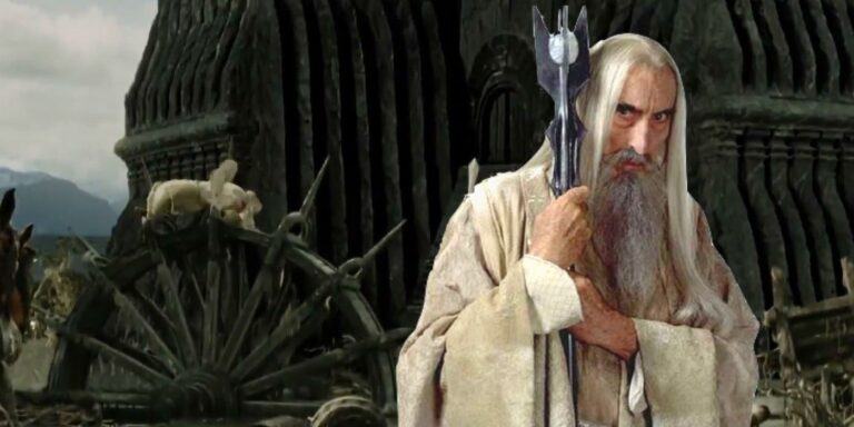 Saruman holding his staff in front front of the tower of Isengard in The Two Towers.