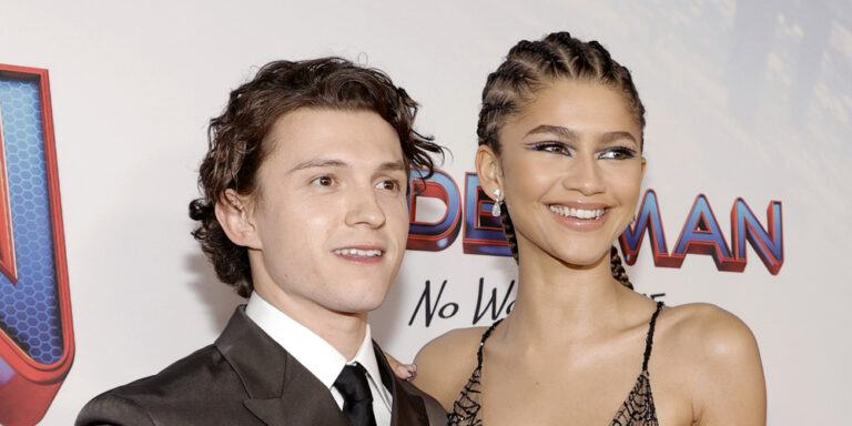 Tom Holland and Zendaya hug and kiss on a romantic boat trip through Italy