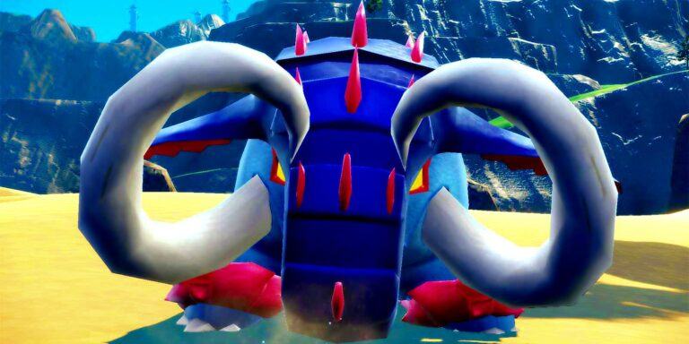 The Great Tusk, the Quaking Earth Titan staring at the camera in Pokémon Scarlet