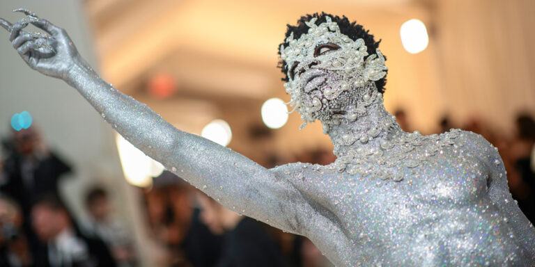 Lil Nas X paints himself silver, covers himself with pearls and wears a thong for the Met Gala 2023