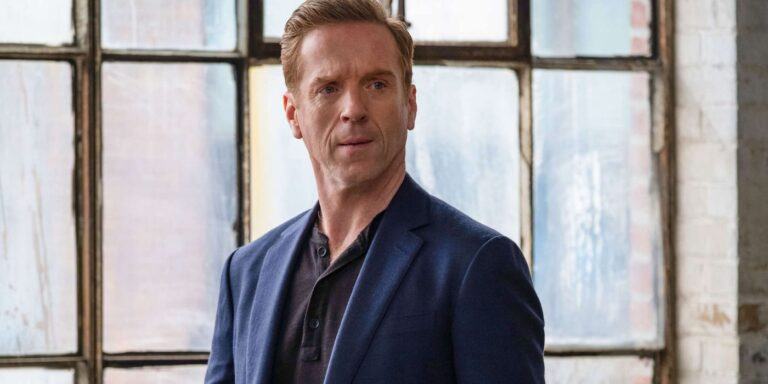 Damien Lewis as Bobby looking to his side in a blue coat in Billions