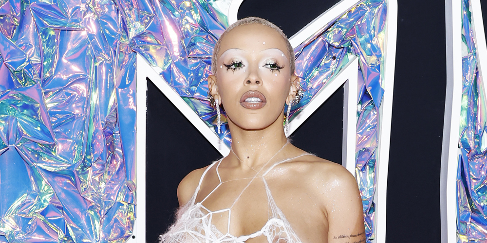 Doja Cat sports a revealing spiderweb look on the 2023 MTV VMAs red